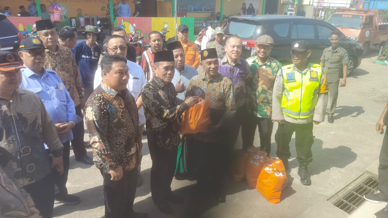 Polsek Tanjung Batu Lakukan Pengamanan  Pemberian Bantuan Korban Kebakaran