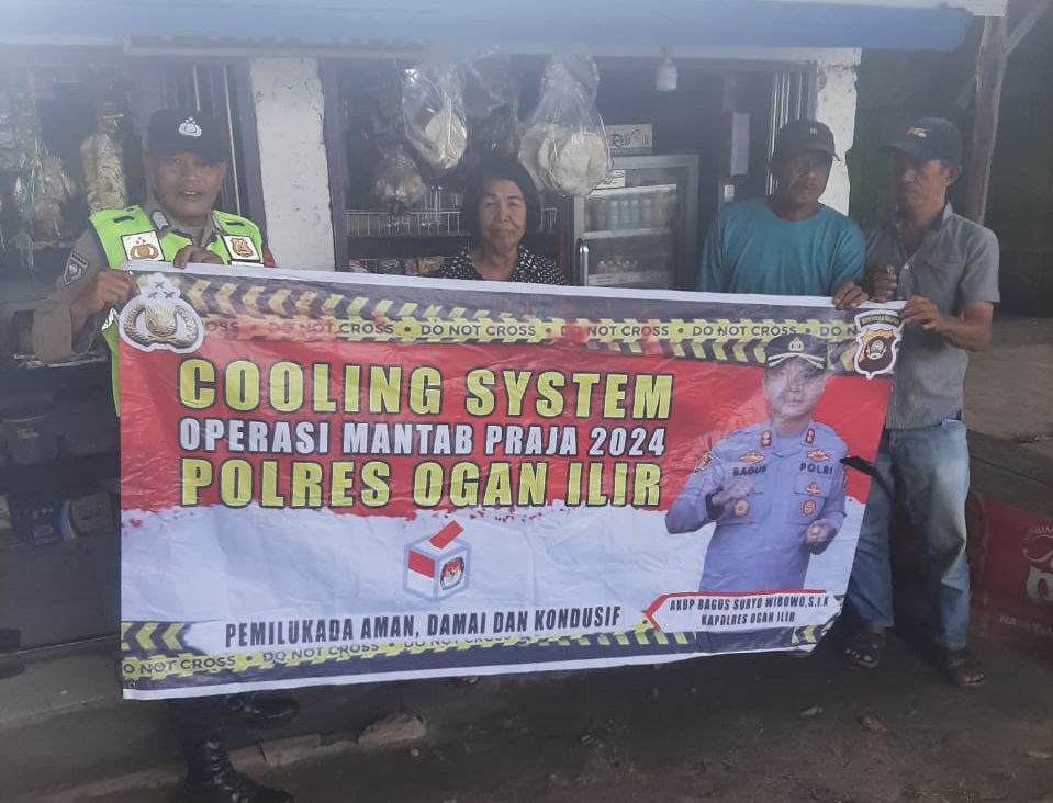 Polsek Pemulutan Lakukan Cooling Sistem, Pasang Spanduk Himbauan Pilkada