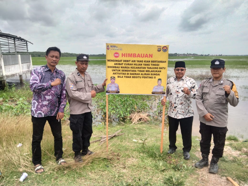 Debit Air Naik, Polsek Tanjung Batu Himbau Waspada