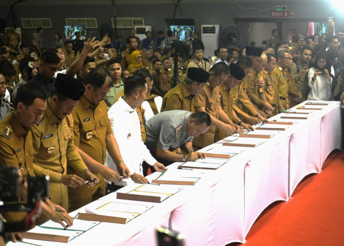 Kanwil Kemenkum Saksikan Penandatanganan Rancangan Peraturan Kepala Daerah Penyelenggaraan Koperasi Desa