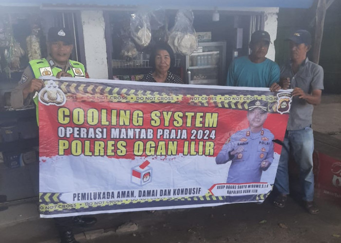 Polsek Pemulutan Lakukan Cooling Sistem, Pasang Spanduk Himbauan Pilkada