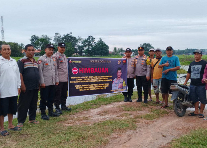 Polsek Tanjung Batu Pasang Spanduk, Himbau Jangan Mandi Di Sungai