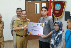Pj Sekda Ogan Ilir  Serahkan  Bantuan Peralatan bagi Pelaku Usaha