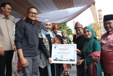 Dandim 0402 OKI-Ketua Persit KCK Hadiri Midang Morge Siwe