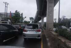 Palembang Diguyur Hujan, Jl H Barlian Macet