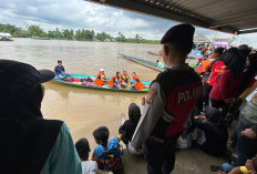 Polsek Pemulutan  Lakukan Pengamanan Perlombaan Perahu Bidar Mini di Desa Sembadak Ogan Ilir